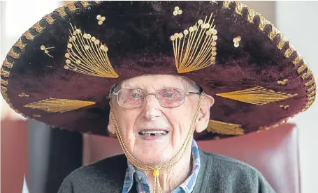  ?? Pictures: Wullie Marr, ?? Resident Wullie Little with a souvenir sombrero which he thought had been lost in the fire.
