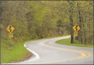  ?? Photo/NWA Democrat-Gazette/Flip Putthoff) ?? Curvy roads along Arkanas 103, seen here in April 2020, and Arkansas 215 keep drivers on their toes.
(File