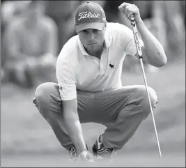  ?? ASSOCIATED PRESS ?? JUSTIN THOMAS lines up a putt on the 16th green during round five at the Dell Technologi­es Match Play tournament, Saturday in Austin, Texas.