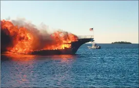  ?? Associated Press photo ?? In this photo provided by Pasco County, flames engulf a boat Sunday in the Tampa Bay area.