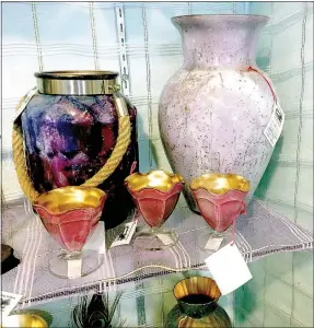  ?? Photo submitted ?? Sandy and Ed Prill use recycled glass to create one-of-a-kind vases and decorative bowls.