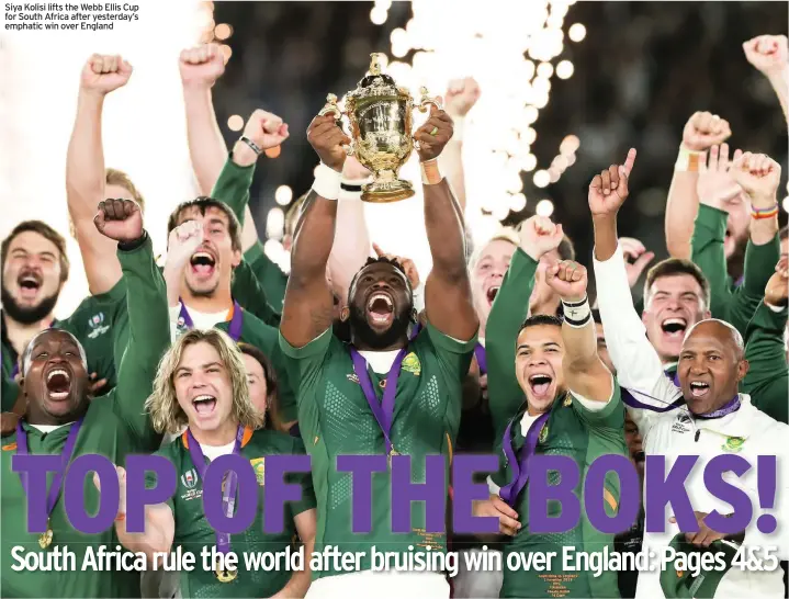  ??  ?? Siya Kolisi lifts the Webb Ellis Cup for South Africa after yesterday’s emphatic win over England