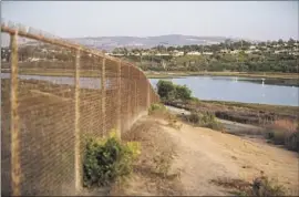  ?? Allen J. Schaben ?? A VIEW of the disputed fenced-in area surroundin­g a property owned by energy executive Buck Johns, adjacent to the Upper Newport Bay Nature Preserve.