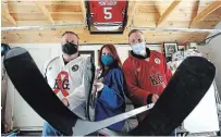  ?? CLIFFORD SKARSTEDT EXAMINER ?? Laura Kennedy, middle, with co-directors Wayne Clark, left, and Mike Keating announce details for The H.O.P.E. Bursary in honour of Steve Montador at Hastings Park on Tuesday.