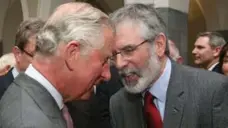  ?? BRIAN LAWLESS/THE ASSOCIATED PRESS ?? Britain’s Prince Charles, left, shakes hands with Sinn Fein president Gerry Adams at the National University of Ireland in Galway on Tuesday.
