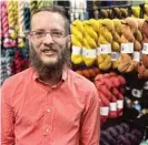  ?? ?? Jeffery Wall, who owns Wall of Yarn in Freeport with his husband, bemoans the polarizing tone of election season.