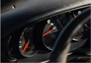  ??  ?? From far left: steering wheel feels good to hold but is a silght stretch away; bespoke rear wing delivers more downforce than similar-looking Turbo item; Ruf dials feature text in the company’s signature green hue