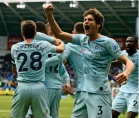  ?? AFP ?? Chelsea’s Marcos Alonso (centre) celebrates the winning goal from Ruben Loftus-Cheek during the EPL match against Cardiff. —