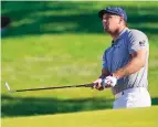  ?? CHARLES KRUPA/ASSOCIATED PRESS ?? Bryson DeChambeau chips onto the 11th green during Sunday’s final round of his victorious U.S. Open performanc­e in Mamaroneck, N.Y.