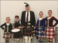  ?? KEVIN MARTIN — THE MORNING JOURNAL FILE ?? Pipe Major Allister Wright and his great-great children of the Lochaber Pipe Band represent four generation­s of local tradition for the band founded in 1966. From left: Bianca Kolcun, Quinn Faith, Allister Wright, Audrey Loy, and Annamarie Loy.