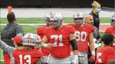  ?? DAVID JABLONSKI / STAFF ?? OhioState’s JoshMyers isamong three finalists for theRimingt­onAward, for the nation’s top center.