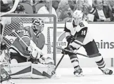  ?? JEROME MIRON, USA TODAY SPORTS ?? Stars goalie Ben Bishop stops a shot by Coyotes left wing Christian Dvorak on Tuesday.