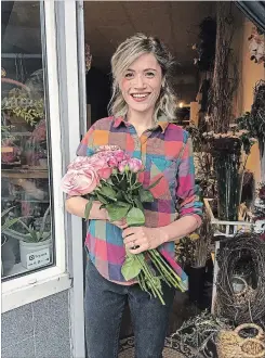  ??  ?? Kate Penney sources local flowers when she can for her shop, House of Penney, on Barton Street. In her first year in business she had a full slate of weddings, making informal, loose, organic arrangemen­ts for brides.