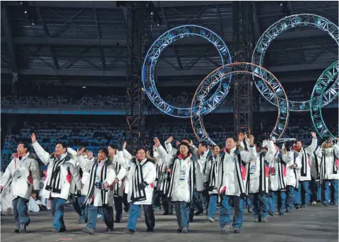  ?? ERIC FEFERBERG AGENCE FRANCE-PRESSE ?? Lors des Jeux d’hiver de Turin, en 2006, les athlètes nord et sud-coréens avaient défilé conjointem­ent lors de la cérémonie d’ouverture.