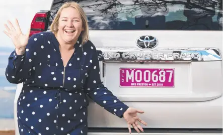  ?? Picture: Kevin Farmer ?? CAPTION THIS: Toowoomba resident Lisa-Marie Preston is one of the first Toowoomba residents to take up the option of adding a caption to her colour personalis­ed plates.