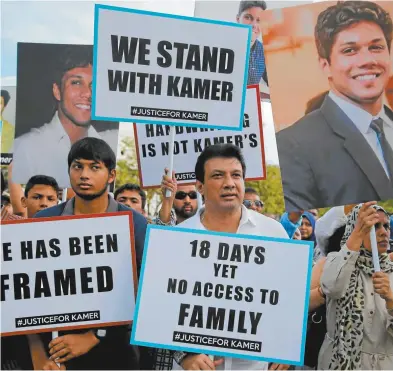  ??  ?? Family members of Mohamed Kamer Nizamdeen and activists protest last month in Colombo, Sri Lanka.