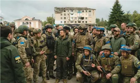  ?? LEO CORREA/AP ?? Many have called for Ukrainian President Volodymyr Zelenskyy, center, and the people of Ukraine to be recognized for the Nobel Peace Prize.