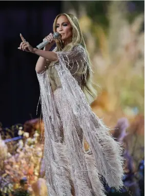  ??  ?? Jennifer Lopez performs at the Vax Live concert at Sofi Stadium.
