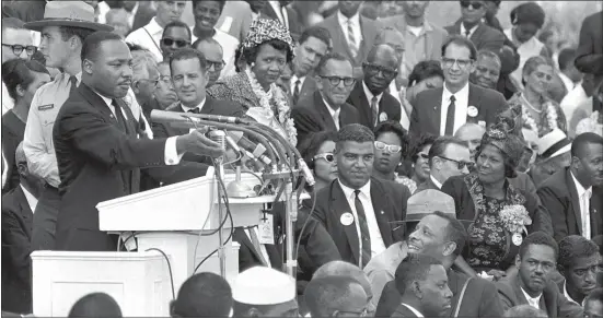  ?? ASSOCIATED PRESS ?? In this Aug. 28, 1963photo, the Rev. Dr. Martin Luther King Jr., head of the Southern Christian Leadership Conference, speaks to thousands during his “I Have a Dream” speech in front of the Lincoln Memorial for the March on Washington for Jobs and Freedom.
