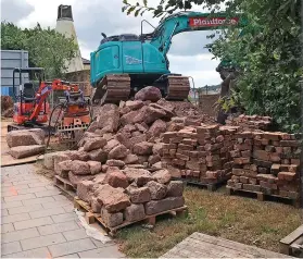  ?? ?? Part of the Roman wall in Exeter when it crumbled in 2019