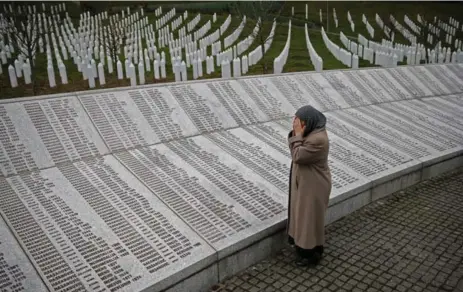  ?? DADO RUVIC/REUTERS ?? Bida Smajlovic prays at the Srebrenica memorial on Thursday. Smajlovic lost her husband and brother and dozens members of family in the massacre.