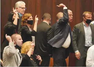  ?? ( Shmulik Grossman/ Knesset Spokespers­on) ?? OPPOSITION MEMBERS shout at the Knesset speaker after a vote yesterday to establish an inquiry into the Submarine Affair was canceled.