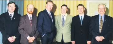  ?? ?? Ballyporee­n/Skeheenari­nky juvenile GAA officers with guests at their victory social in Kilcoran Lodge Hotel in January 2001. L-r: Michael McGrath (secretary), Tom Flannelly (treasurer), special guest Micheal Ó Muircheart­aigh; Tipperary hurling and football star Declan Browne; Donie Cahill (chairman) and Mick Lonergan (chairman Tipperary County Bord na nÓg).