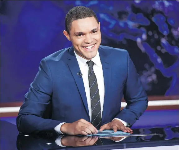  ?? EVAN AGOSTINI/INVISION ?? The Daily Show “has shifted from being a space of fake news to a space where we’re dealing with real news,” says Trevor Noah, its host of three years.