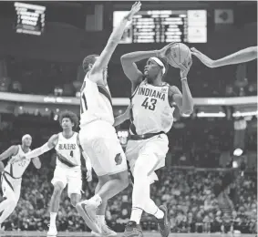  ?? SOOBUM IM/USA TODAY SPORTS ?? Pacers power forward Pascal Siakam (43) looks to pass while defended by Trail Blazers point guard Malcolm Brogdon on Friday.