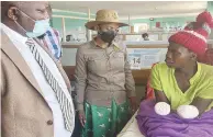  ?? ?? Deputy Minister of Environmen­t, Climate, Tourism and Hospitalit­y Industry Cde Barbra Rwodzi and the Masvingo Minister of State for Provincial Affairs and Devolution, Cde Ezra Chadzamira on a visit to the hyena attack victims at Masvingo Provincial Hospital