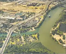  ?? Al Seib Los Angeles Times ?? URBAN users could pay 55% of the delta tunnel costs, the MWD says. Above, the American, left, and Sacramento rivers meet.