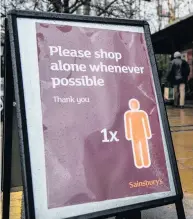  ??  ?? ● A supermarke­t sign informing customers of shopper restrictio­ns