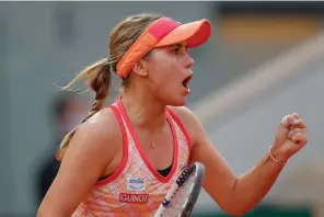  ?? AP Photo/Michel Euler ?? ■ Sofia Kenin of the U.S. clenches her fist after scoring a point against Petra Kvitova of the Czech Republic in the semifinal match of the French Open tennis tournament at the Roland Garros stadium Thursday in Paris, France.