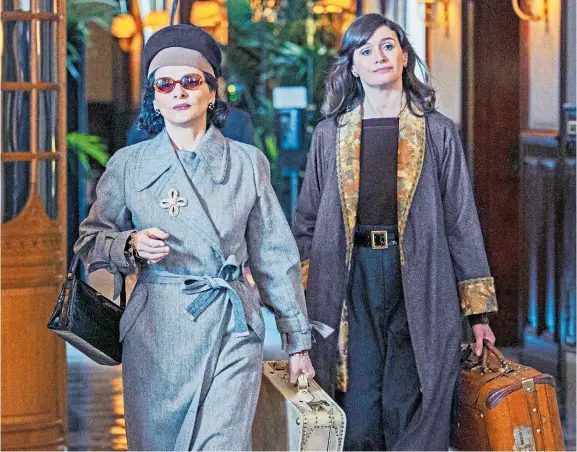 ?? ?? Bag lady Juliette Binoche (left) stars as Coco Chanel in Apple TV’S drama The New Look, which the streaming service describes as a gripping historical series “inspired” by true events. Ben Mendelsohn also stars as Christian Dior in the show which was filmed exclusivel­y in Paris.