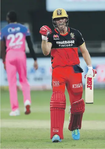  ?? Sportzpics for BCCI ?? Royal Challenger­s Bangalore’s AB de Villiers hit an unbeaten 50 against Rajasthan Royals at the Dubai Cricket Stadium yesterday