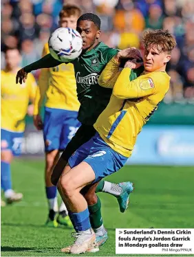  ?? Phil Mingo/PPAUK ?? > Sunderland’s Dennis Cirkin fouls Argyle’s Jordon Garrick in Mondays goalless draw