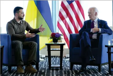  ?? SUSAN WALSH — THE ASSOCIATED PRESS ?? President Joe Biden, right, meets with Ukrainian President Volodymyr Zelenskyy on the sidelines of the G7summit in Hiroshima, Japan, on Sunday.