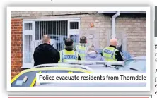  ??  ?? Police evacuate residents from Thorndale