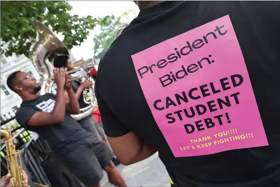  ?? PAUL MORIGI — GETTY IMAGES ?? Student loan borrowers staged a rally in front of The White House to celebrate President Biden cancelling student debt last summer. That move is now before the Supreme Court.