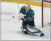  ?? NHAT V. MEYER — BAY AREA NEWS GROUP ?? San Jose Sharks goaltender Martin Jones blocks a shot against the Colorado Avalanche during a game in March.