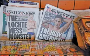 ?? LUCAS JACKSON / REUTERS ?? Disgraced Olympic champion swimmer Ryan Lochte is pictured on the front page of New York newspapers last week.