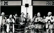  ?? Photo: SCMP ?? Yue Kwok-chun (centre), managing director of Yue Hwa Chinese Products, at the opening of its Park Lane store in 1986.