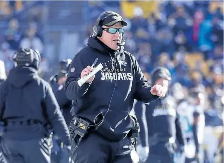  ?? ROB CARR/GETTY IMAGES ?? The Jacksonvil­le Jaguars bought what Doug Marrone, pictured above, was selling when he became the head coach last year. Tougher practices and no pingpong in the dressing room, among others, have paid off for the Jags, as they’re set to take on the New...