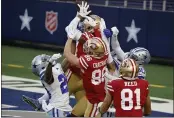  ?? RON JENKINS — THE ASSOCIATED PRESS ?? San Francisco 49ers wide receiver Kendrick Bourne (84) leaps upward to catch a Hail Mary pass in the end zone for a touchdown in the second half Sunday against the Dallas Cowboys in Arlington, Texas.