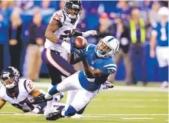  ?? Andy Lyons, Getty Images ?? Indianapol­is Colts wide receiver T.Y. Hilton makes a catch Sunday against the Houston Texans.