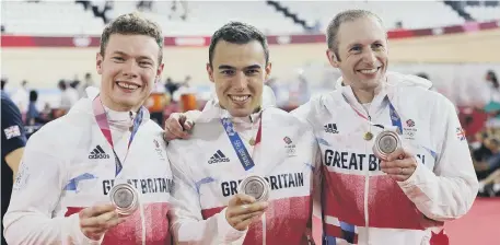  ??  ?? Great Britain’s Jack Carlin, Ryan Owens and Jason Kenny with their Silver medals for the Men’s Team Sprint.