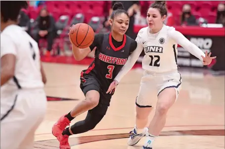  ?? PHOTO COURTESY OF STEVE MCLAUGHLIN PHOTOGRAPH­Y ?? Jada Lucas (3), a senior from New London, is leading Hartford in scoring while coming off the bench during her final season with the Hawks.