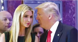  ?? —AFP ?? NEW YORK: This file photo taken on January 11, 2017 shows US President-elect Donald Trump talking to his daughter Ivanka during a press conference at Trump Tower in New York.
