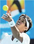  ?? —AP ?? Defiant: India’s Somdev Devvarman serving to Germany’s Bjorn Phau during their first round match yesterday.