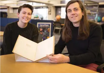  ??  ?? Harvard’s librarian for collaborat­ive programs, Nico Carver (above, at right) and assistant community coordinato­r Sam Correia hope to identify the mainly anonymous women who logged the heavens in a rediscover­ed collection of notebooks. The books – part of the Astrograph­ic catalogue – hold records of star exposures like the plate (opposite) of the Small Magellanic Cloud.